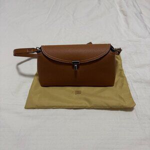 T-Lock grained-leather clutch tan